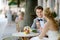 Bride and groom having an ice cream outdoors