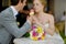 Bride and groom having an ice cream outdoors