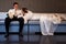 Bride and groom lying in a stylish lounge