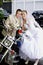 Bride and groom and motorcycle