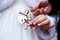 Bride and groom with padlock of love with keys