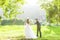 Bride and groom in the park