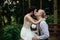 Bride and groom posing on the verandah