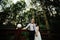 Bride and groom posing on the verandah