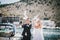 Bride and groom posing with white wedding doves