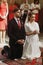 Bride and groom praying at wedding ceremony in church, handsome