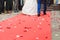 Bride and groom on red carpet