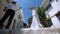 Bride and groom on the street of the old city of Greece