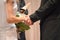 Bride and Grooms Hands Joining in Marriage