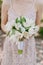 Bride Hold in Hand Tulip Wedding Bouquet Outside