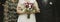 Bride holding bouquet of flowers with her father and mother at the entrance of the religious ceremonial