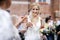 Bride holding champagne glass