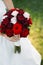 Bride holding floral bouquet