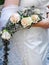 Bride holding her bridal flower bouquet