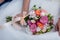 Bride holding wedding beautiful bouquet