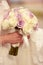 Bride holding wedding bouquet