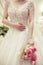 Bride holding the wedding bouquet, Detail image cut