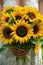 A bride holds a vibrant bouquet of sunflowers