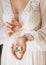 Bride inside white lace dress perfume hands