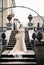 Bride in a long dress on the steps of an old villa. Como. Italy