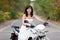 Bride on motorcycle.