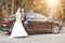 Bride near wedding car
