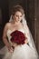 Bride portrait in front of rustic door