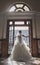 Bride portrait in front of vintage doors