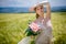 Bride posing in field