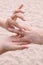 Bride puts ring on Groom - Beach Wedding