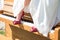 Bride with red shoes on piano