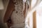 Bride`s back wedding dress with buttons