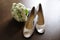 Bride\'s shoes with a lucky coin