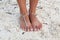 Bride`s Toes in Sand with Barefoot Sandals