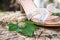 Bride``s wedding ring on green leaf and shiny shoe