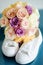 Bride`s white sneackers and beautiful bridal bouquet