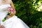 Bride showing off her wedding bouquet