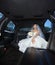 Bride Sitting in Limousine