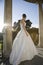 Bride Standing On Balcony