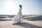 Bride walking barefoot on sand in flowing dress