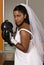 Bride wearing boxing gloves