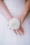 Bride wearing flower ring, close-up,