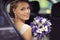 Bride in wedding car