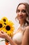 Bride in a wedding dress with a bouquet of sunflowers.Beautiful woman.Floristics