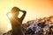 Bride in wedding dress at sunset in Santorini Greece