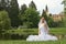 Bride on the wedding in park