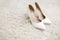 Bride white footwear on the white carpet. Wedding concept.