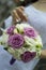 Bride or woman holding an elegant bouquet