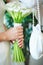 Brides hands with bouquet