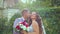 Brides kissing near medieval wall with ivy. slow motion handy camera motion style